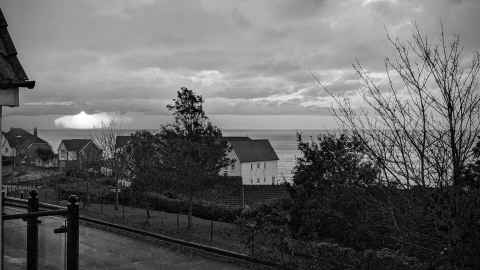 View across to France just after sunrise, from our house