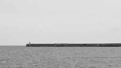 Folkestone harbour arm from a distance