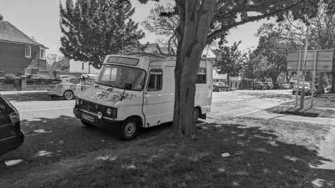 Ambulance camper van parked outside our old flat on Earls Avenue