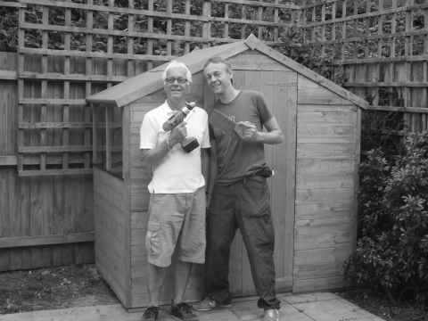 Dad and me stood proudly in front of the shed we put together