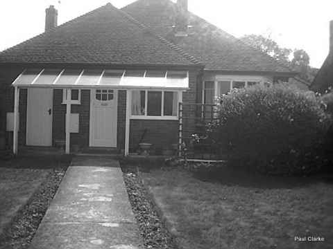 The bungalow before they started messing with it.