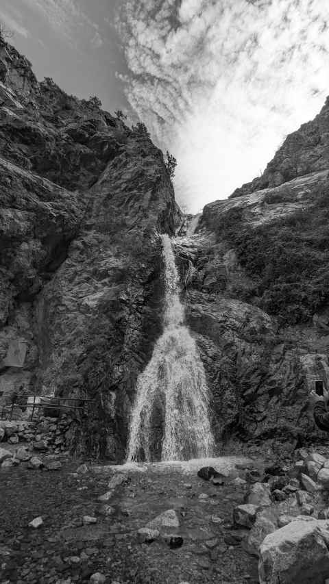 Slightly underwhelming waterfall with suspicious pipes all around it