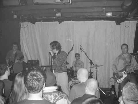 David Devant on stage at Dingwalls, but in black and white