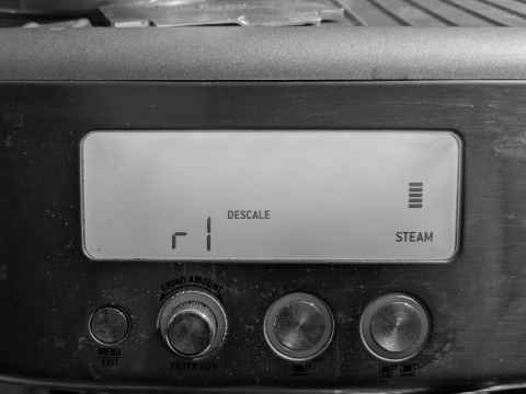 Screen of my coffee machine telling me now descale the steam wand...