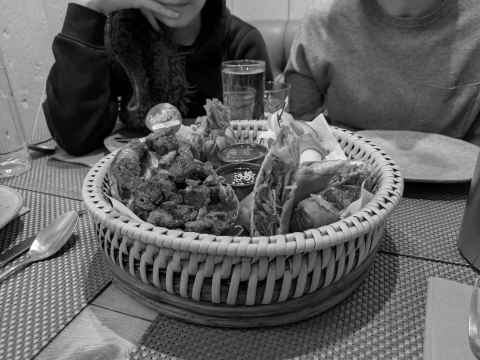 Sharing non-vegan starter in Giggling Squid, Brighton