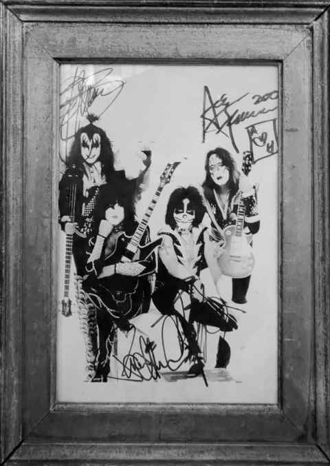Signed KISS picture on the wall in The Old Coffee House
