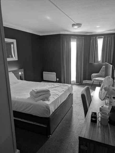 First hotel room, with missing bed