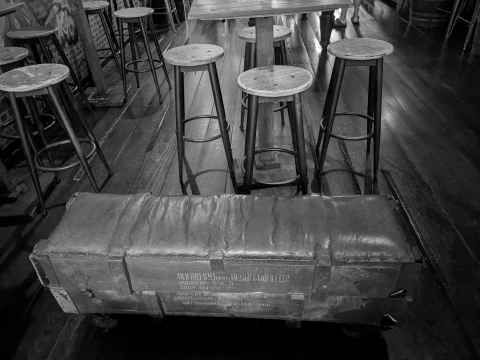 Ammo box seating in Delirium bar